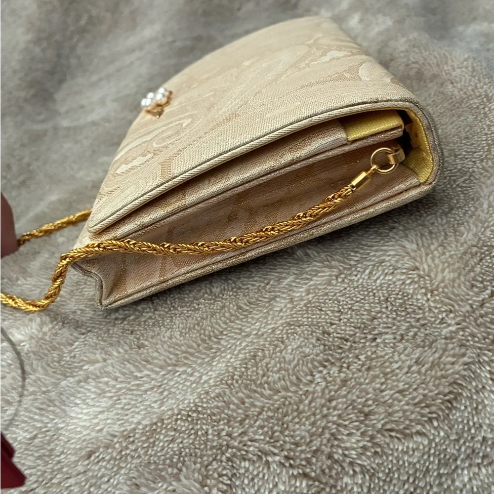 Mikimoto Cream Clutch with Gold Accents